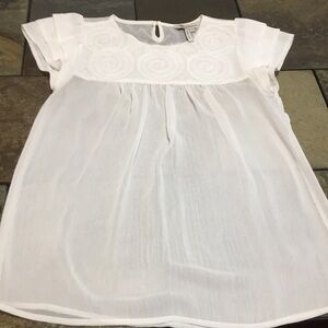 BCBG White Ruffled short sleeve. Sheer top. Size XS